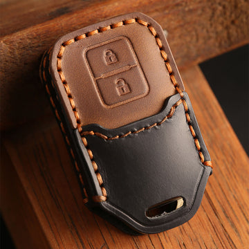 Keyzone dual leather key cover for Swift, DZire, Baleno, Ertiga, Grand Vitara, Brezza, Fronx, Jimny XL6, Ignis, Glanza, Urban Cruiser Hyryder, Rumion 2 button smart key (KDL05)